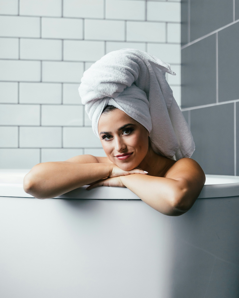 High-quality shampoo being applied to hair, showcasing its rich lather and gentle cleansing.